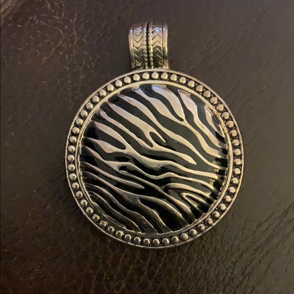 Zebra print pendant.